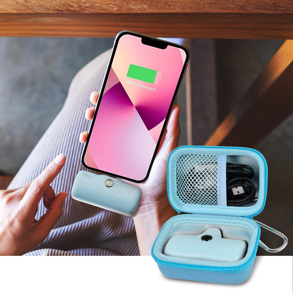 Open blue case organizing a mini power bank and cable beside a charging phone