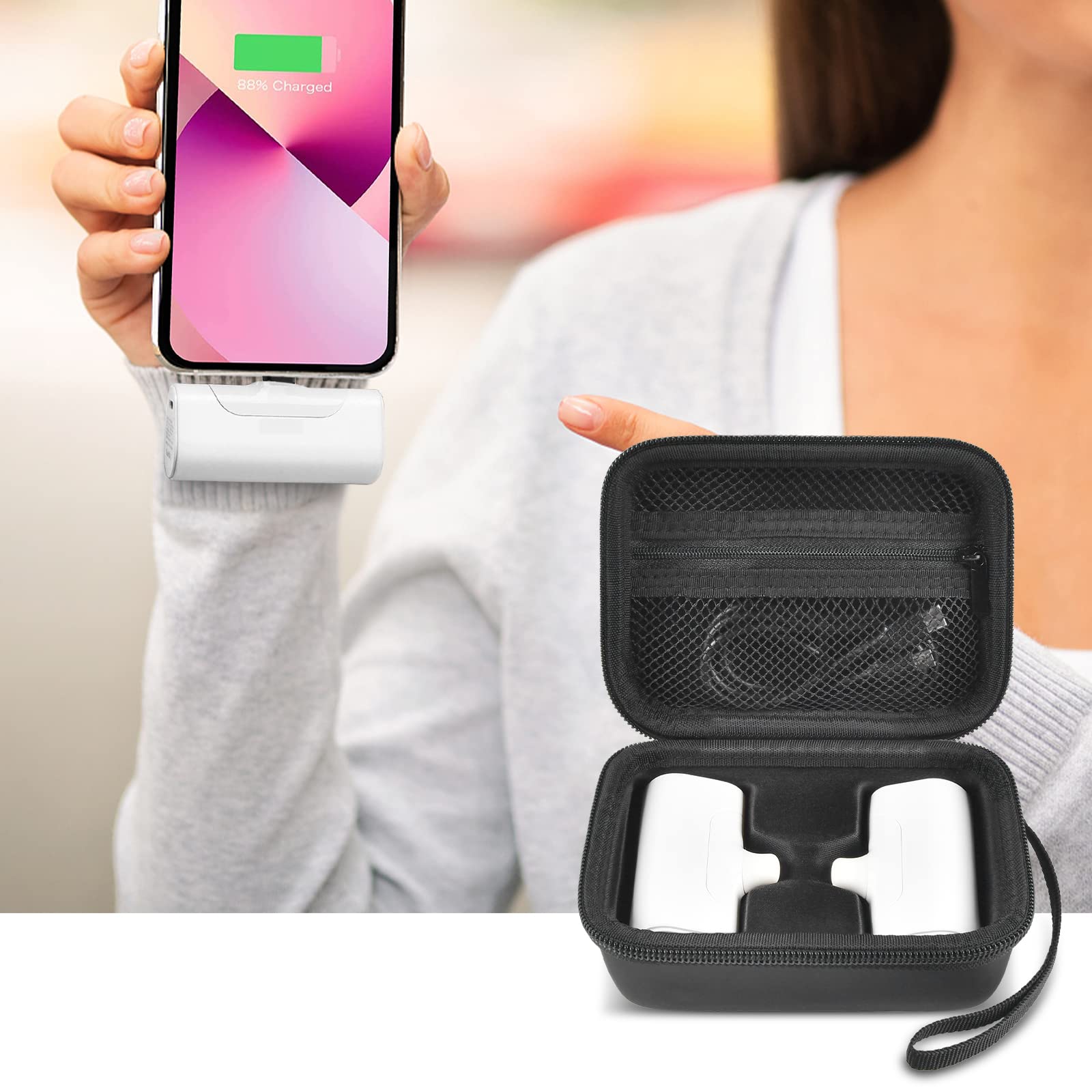 Open black case organizing a mini power bank and cable beside a charging phone