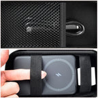 Black case interior securing a magnetic power bank with elastic straps and charging cable in the mesh pocket