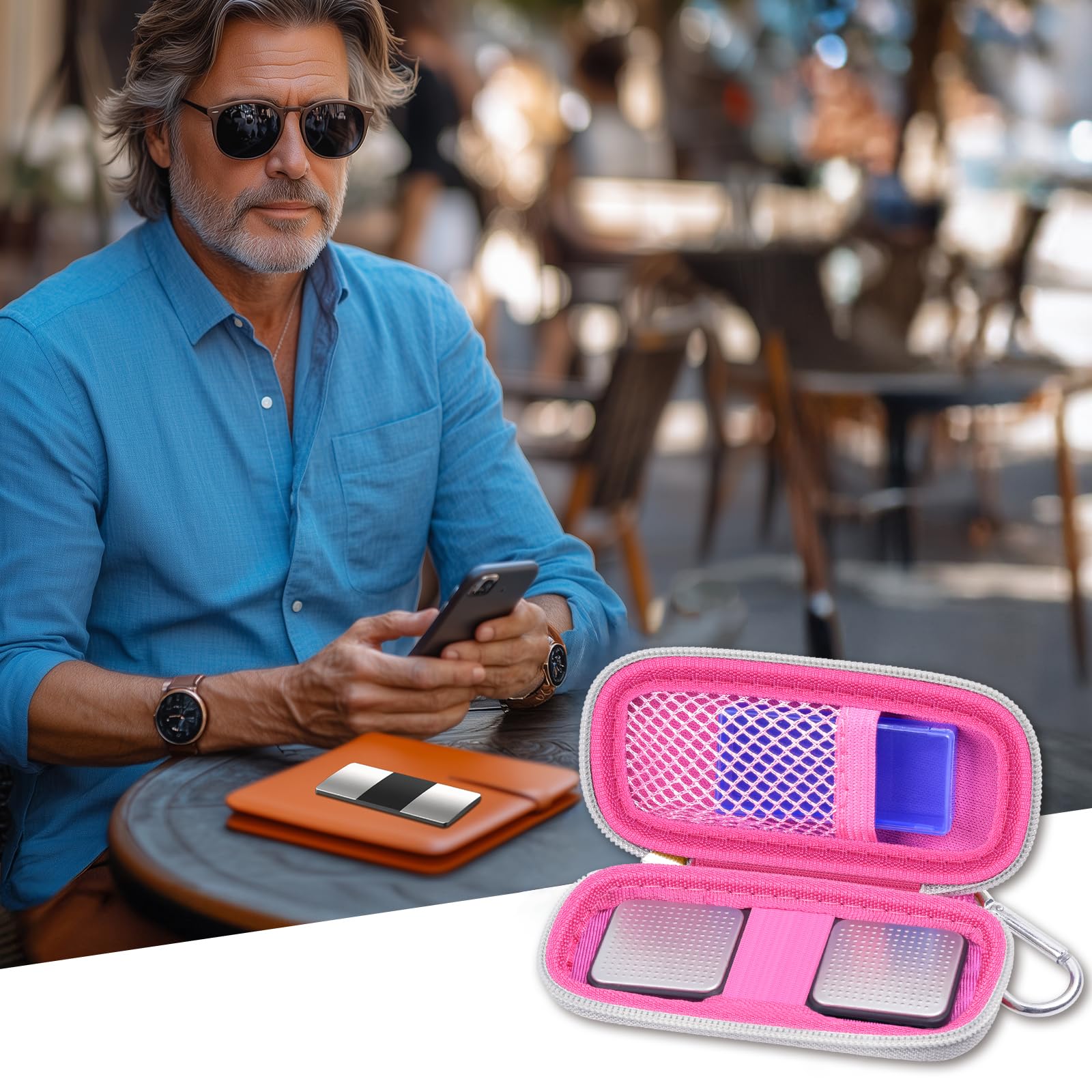 Open black KardiaMobile case beside a heart monitor and accessory organizer