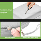 White protective digital camera case scratch-resistant shell, zipper and wrist strap detail