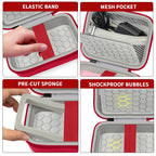 Red camera case interior with elastic strap, mesh pocket, foam insert, and shock-absorbing padding