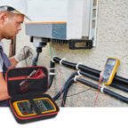 Technician using a digital multimeter beside an open black and red organizer case