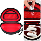 Open black and red headphone case with mesh accessory pocket and folded over-ear headphones
