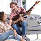 Musician playing guitar beside the gray wireless microphone organizer