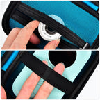 Teal case interior with elastic printer strap and mesh accessory pocket