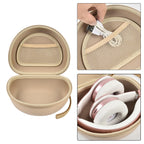 Open beige headphone case with mesh pocket and folded over-ear headphones inside