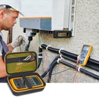 Technician using a digital multimeter beside an open black and yellow organizer case