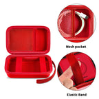 Open red organizer with mesh cable pocket, elastic straps, and divided compartments