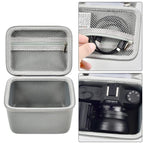 Gray camera organizer interior with mesh accessory pocket and padded divider