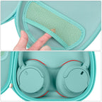 Mint green headphone case interior with mesh accessory pocket and folded headphones