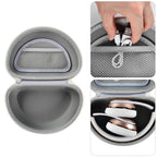 Open white headphone case with mesh accessory pocket and folded over-ear headphones