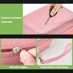 Pink protective digital camera case scratch-resistant shell, zipper and wrist strap detail