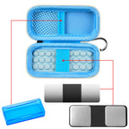 Open blue KardiaMobile case with mesh pocket, sensor area, and accessory compartments