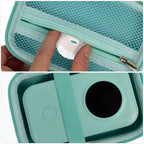 Teal houndstooth case interior with elastic strap securing a mini label printer