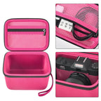 Hot pink camera organizer interior with mesh accessory pocket and padded divider