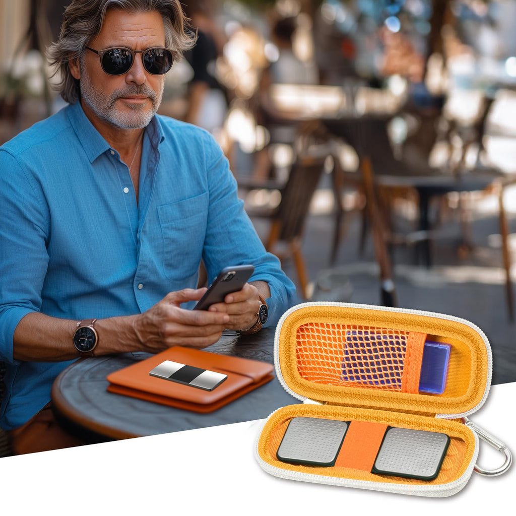Man checking heart rhythm results beside the open orange KardiaMobile organizer