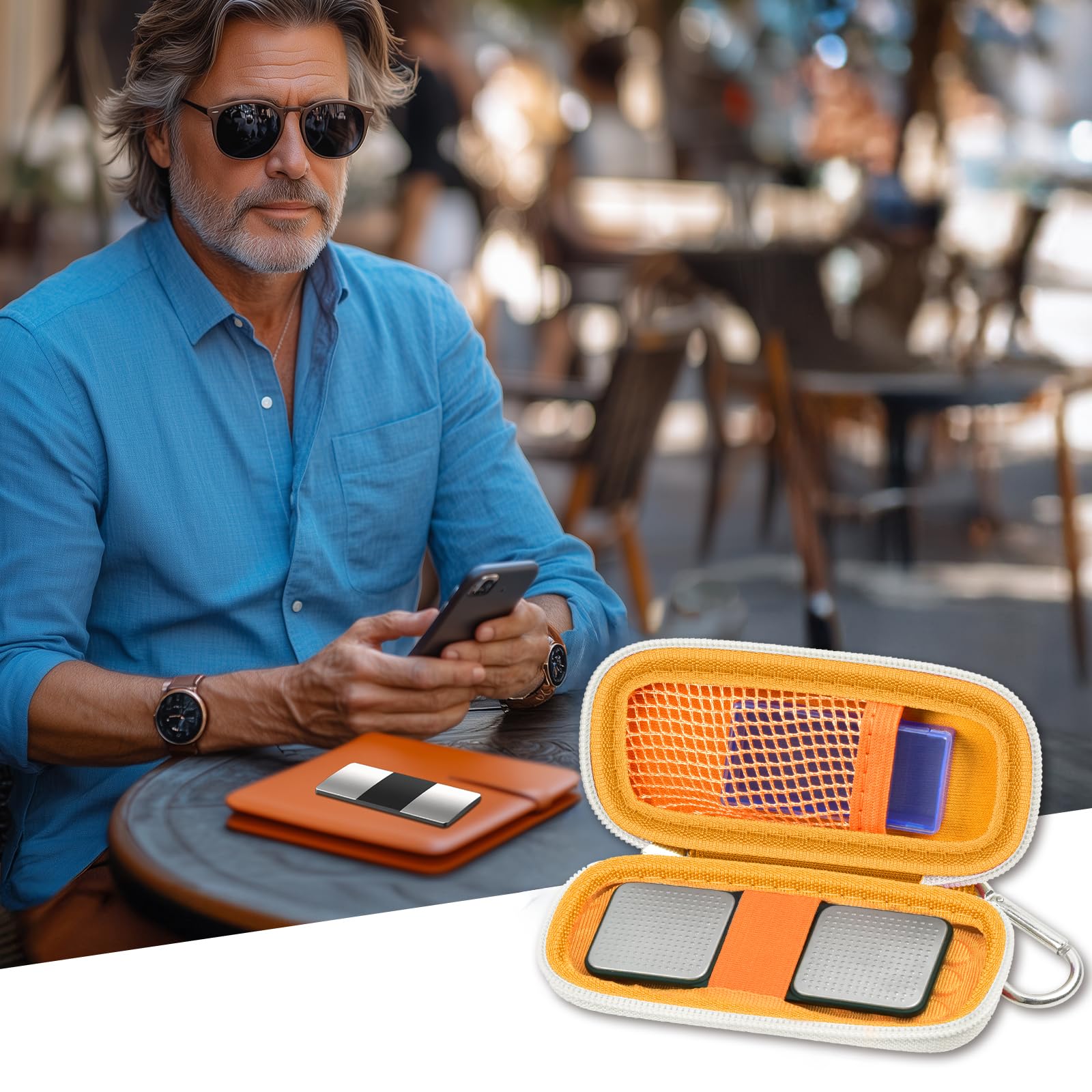 Man checking heart rhythm results beside the open orange KardiaMobile organizer