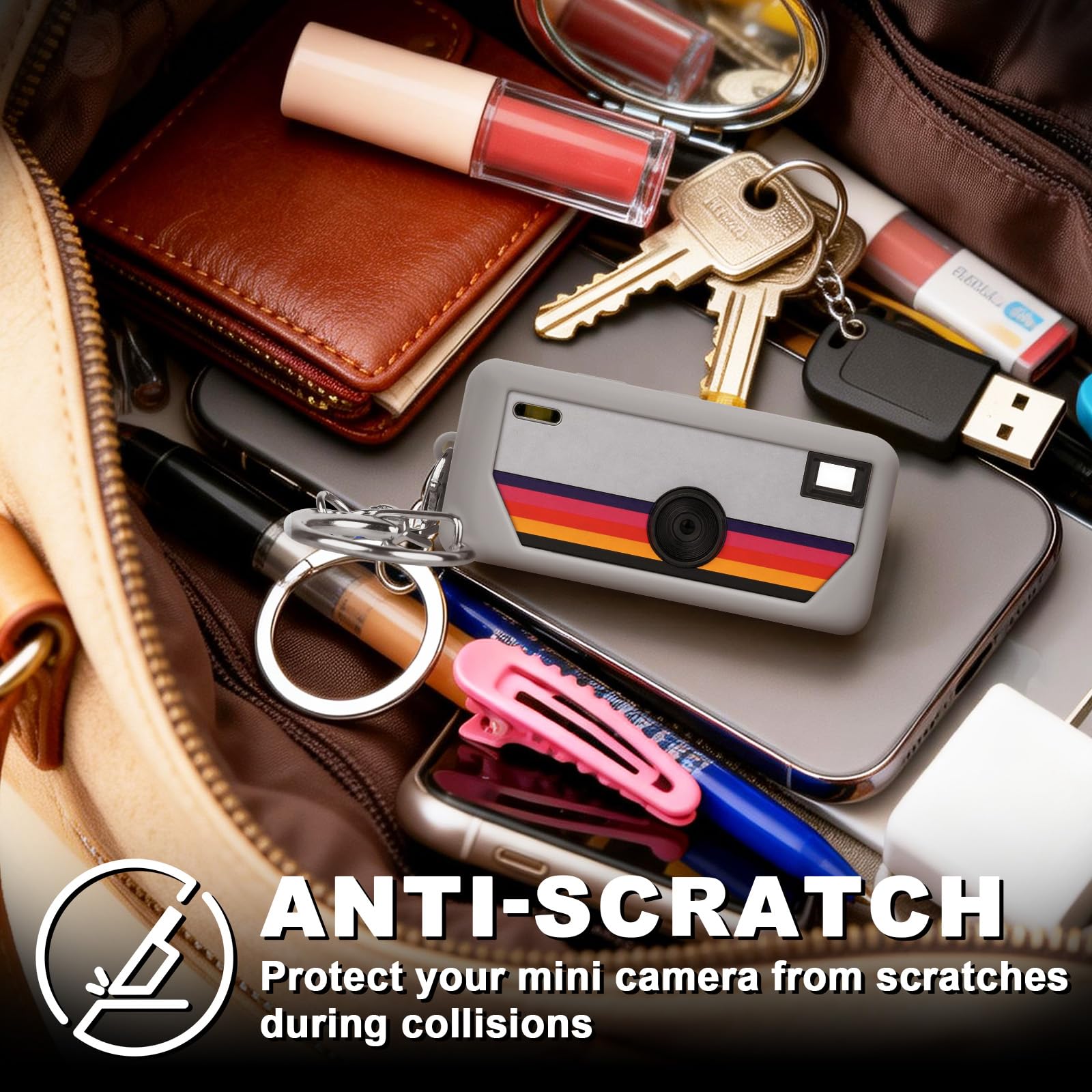 Gray silicone case for Kodak Charmera keychain camera anti-scratch protection shown inside a bag