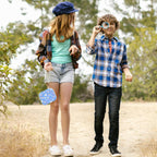 Blue kids instant print camera case carried by a child outdoors