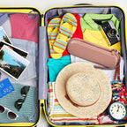 Rose gold electric toothbrush case packed inside a suitcase