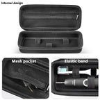 Black toothbrush case interior with mesh pocket, elastic bands, and molded compartments